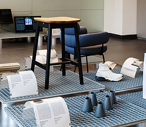 Austrian Design, stool, ceramic object and shoe in the foreground