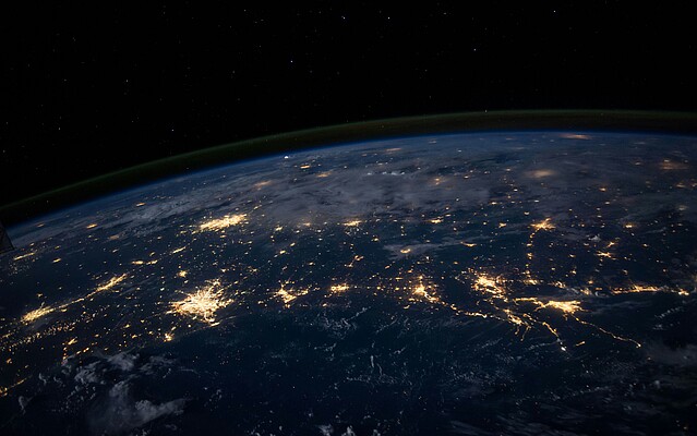 Image of planet Earth as taken from orbit at night. 