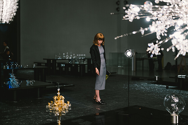 Woman standing in the Lobmeyr showroom