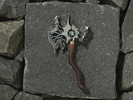 A miniature World of Warcraft weapon