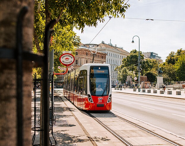 A 71 tram arriving at a station on the Ring Street in Vienna